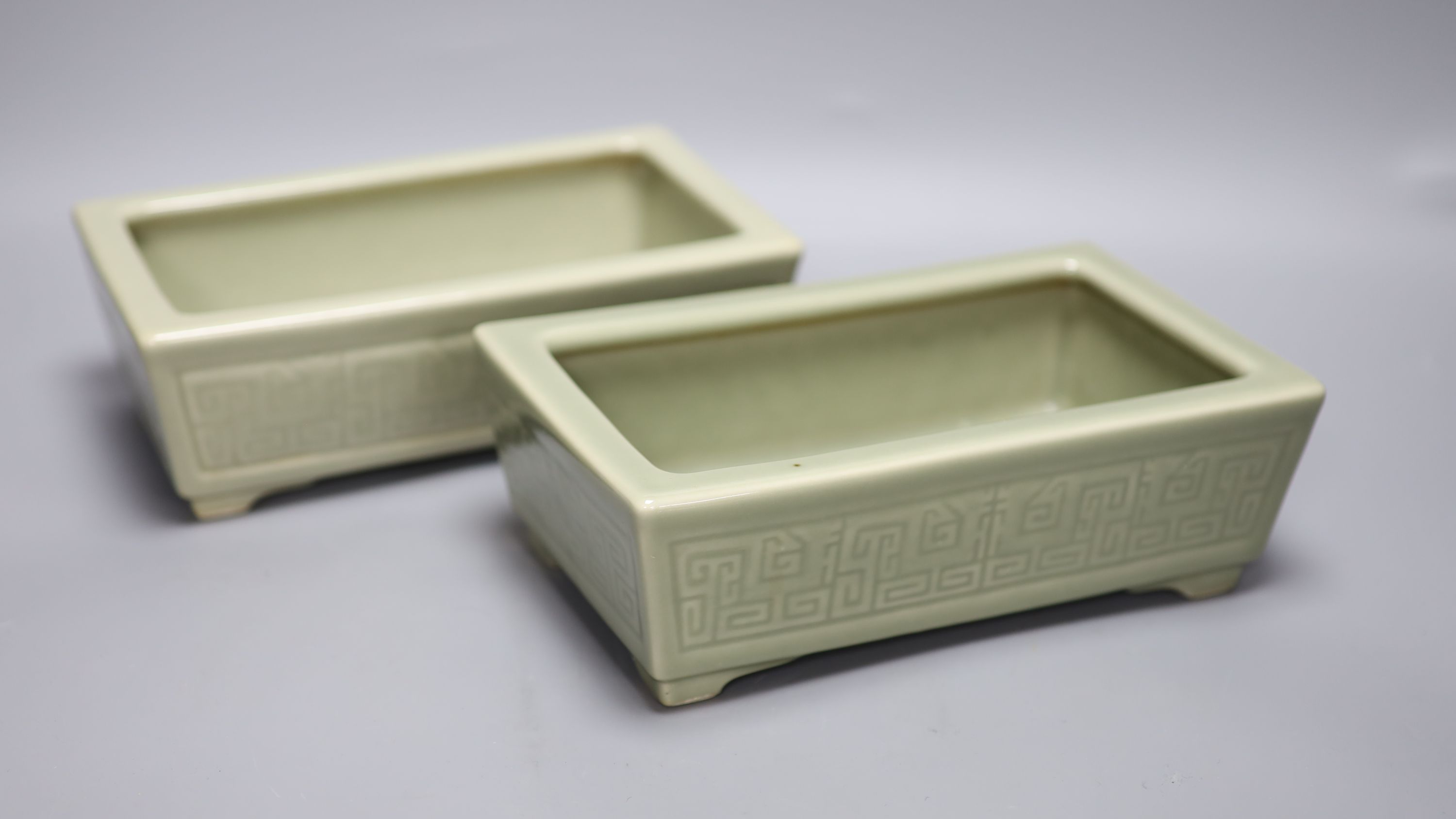 A pair of Chinese celadon glazed rectangular planters, late 19th to 20th century, length 24cm